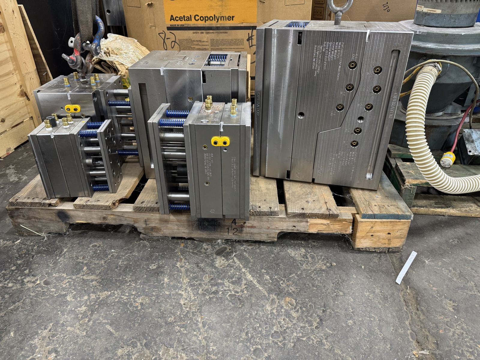 Production injection molds on a pallet